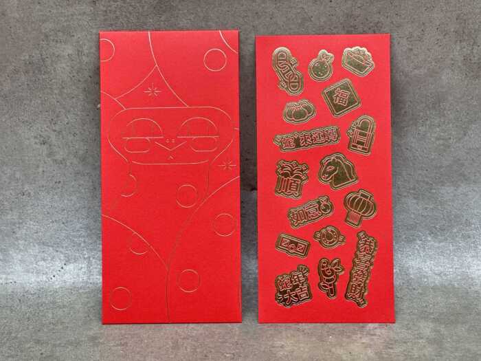 Designer-style red and gold snake envelopes