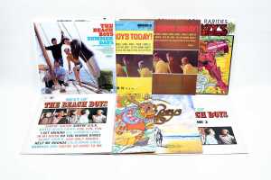 Seven Beach Boys vinyl records, together with 'The Beach Boys 50' official tour program