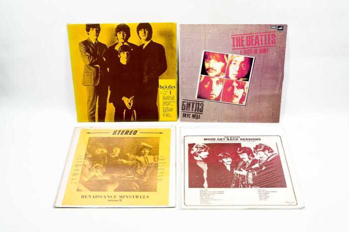 Four Beatles live and compilation vinyl records