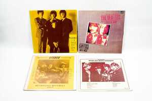 Four Beatles live and compilation vinyl records
