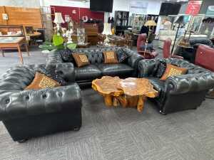 Que Living three-piece Chesterfield-style black leather lounge suite