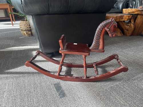 23 · Carved and turned timber children's rocking horse