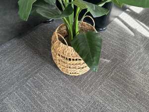 Decorative artificial plant in a woven basket planter - 2