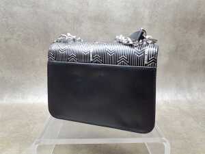 Designer-style black and silver-tone handbag. - 4