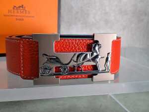Designer-style orange belt with horse and carriage buckle - 2
