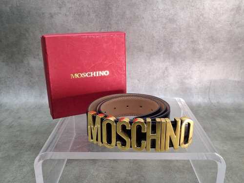 59 · Designer-style black patent and gold-tone belt.