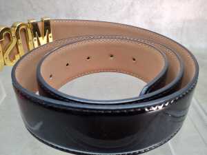Designer-style black patent and gold-tone belt. - 3