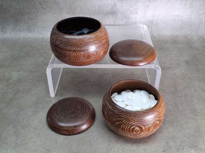 Japanese Go Stones Goishi black and white pieces in timber bowls