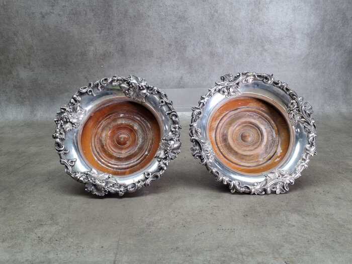 Pair of antique wine coasters