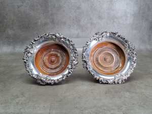 Pair of antique wine coasters