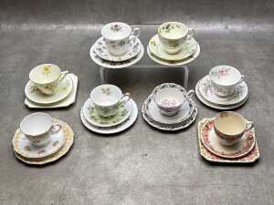 Eight English porcelain Royal Albert and Royal Doulton trios