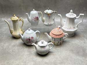 Seven porcelain teapots