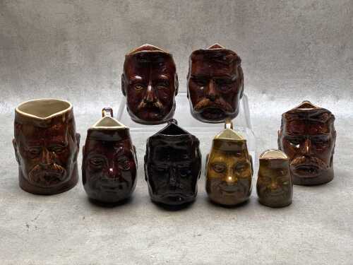Group of mostly Rockingham glazed character jugs.
