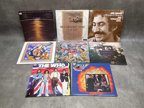 Eight rock vinyl records