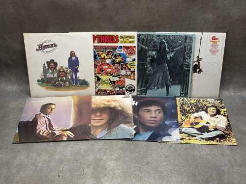 Eight vinyl records