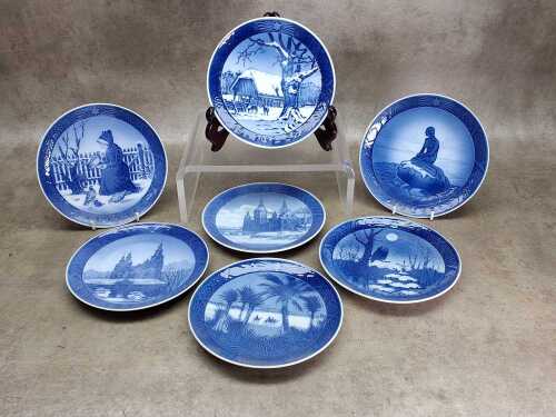 Seven Royal Copenhagen porcelain year plates