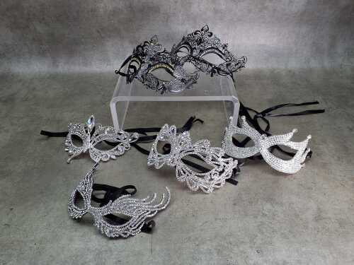 Six silver-toned and black masquerade masks