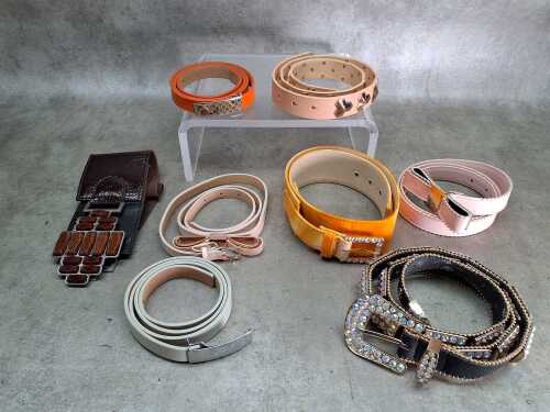 Eight designer-style belts