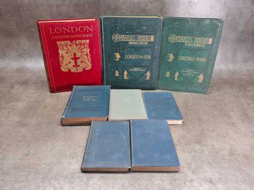 Eight antique books, including Charles Dickens