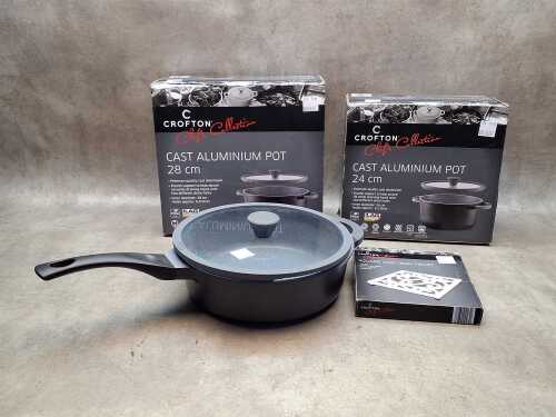 Three pieces of Crofton cast aluminium cookware