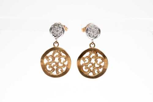 A pair of diamond drop earrings in 9 carat two tone gold