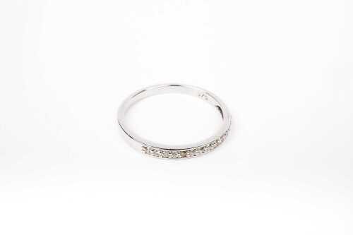 A diamond band in 9 carat white gold