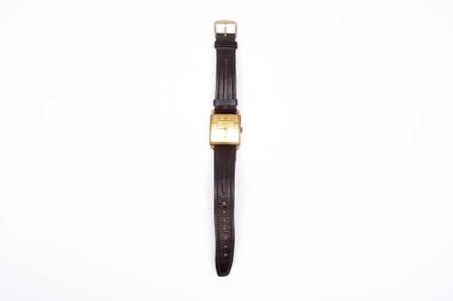 An antique Jewlex Swiss watch in 9 carat rose gold.