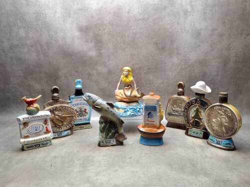 Nine Jim Beam ceramic novelty decanters