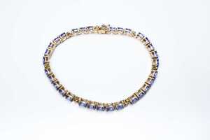 A tanzanite and diamond bracelet in 14 carat yellow gold - 2