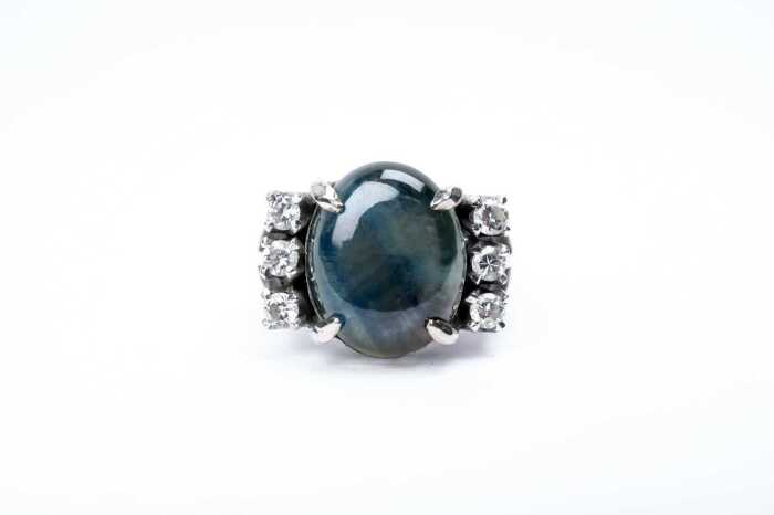 A chatoyant parti sapphire and diamond ring in 18ct white gold