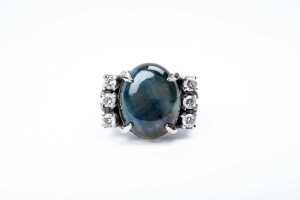 A chatoyant parti sapphire and diamond ring in 18ct white gold