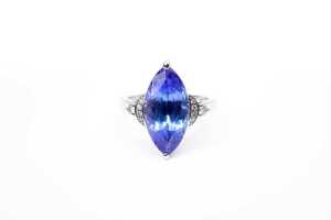 A tanzanite and diamond ring in 14 carat white gold