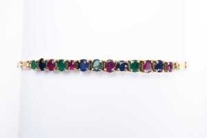 A ruby, sapphire and emerald bracelet in 14 carat yellow gold - 2