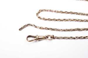 An antique muff chain in 9 carat rose gold - 2