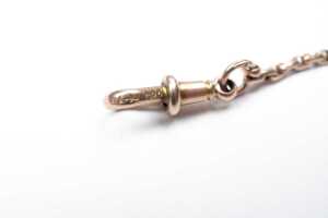 An antique muff chain in 9 carat rose gold - 4