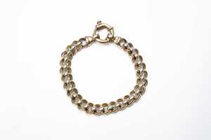 A fancy link bracelet in 9 carat two tone gold