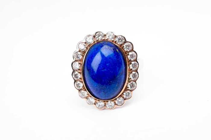 A lapis lazuli and diamond ring in 14 carat rose gold