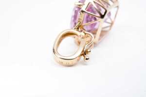 A kunzite and diamond enhancer pendant in 14 carat yellow gold - 4