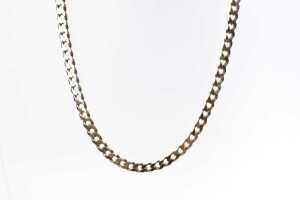 A curb link necklace in 9 carat yellow gold
