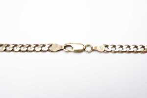 A curb link necklace in 9 carat yellow gold - 4