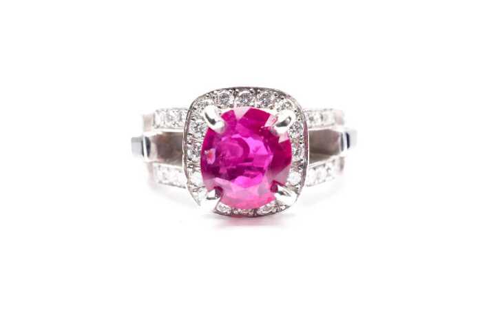 A ruby, sapphire and diamond ring in 18ct white gold