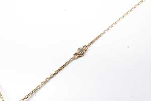 A ruby and diamond cross and necklace in 14 carat yellow gold - 4