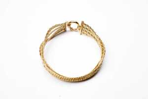 A four-strand fancy link bracelet in 9 carat yellow gold - 2