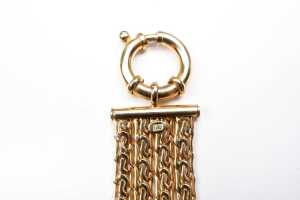 A four-strand fancy link bracelet in 9 carat yellow gold - 4