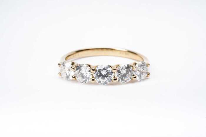 A diamond ring in 14ct carat yellow gold