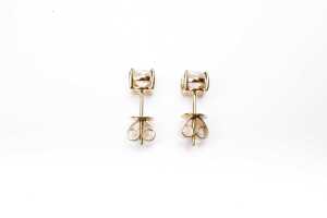 A pair of diamond stud earrings in 14 carat yellow gold - 4