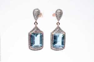 A pair of aquamarine and diamond earrings in 14ct rose gold