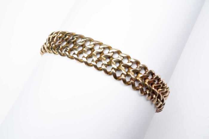 A fancy link bracelet in 14 carat yellow gold