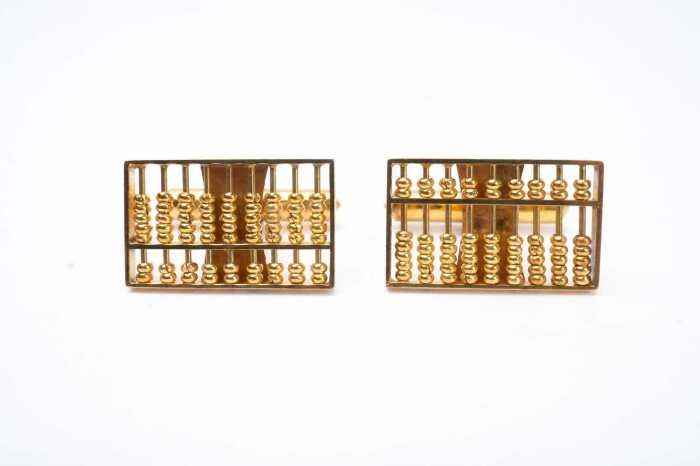 A pair of abacus cufflinks in 14 carat yellow gold