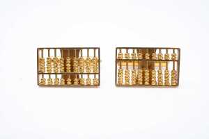 A pair of abacus cufflinks in 14 carat yellow gold